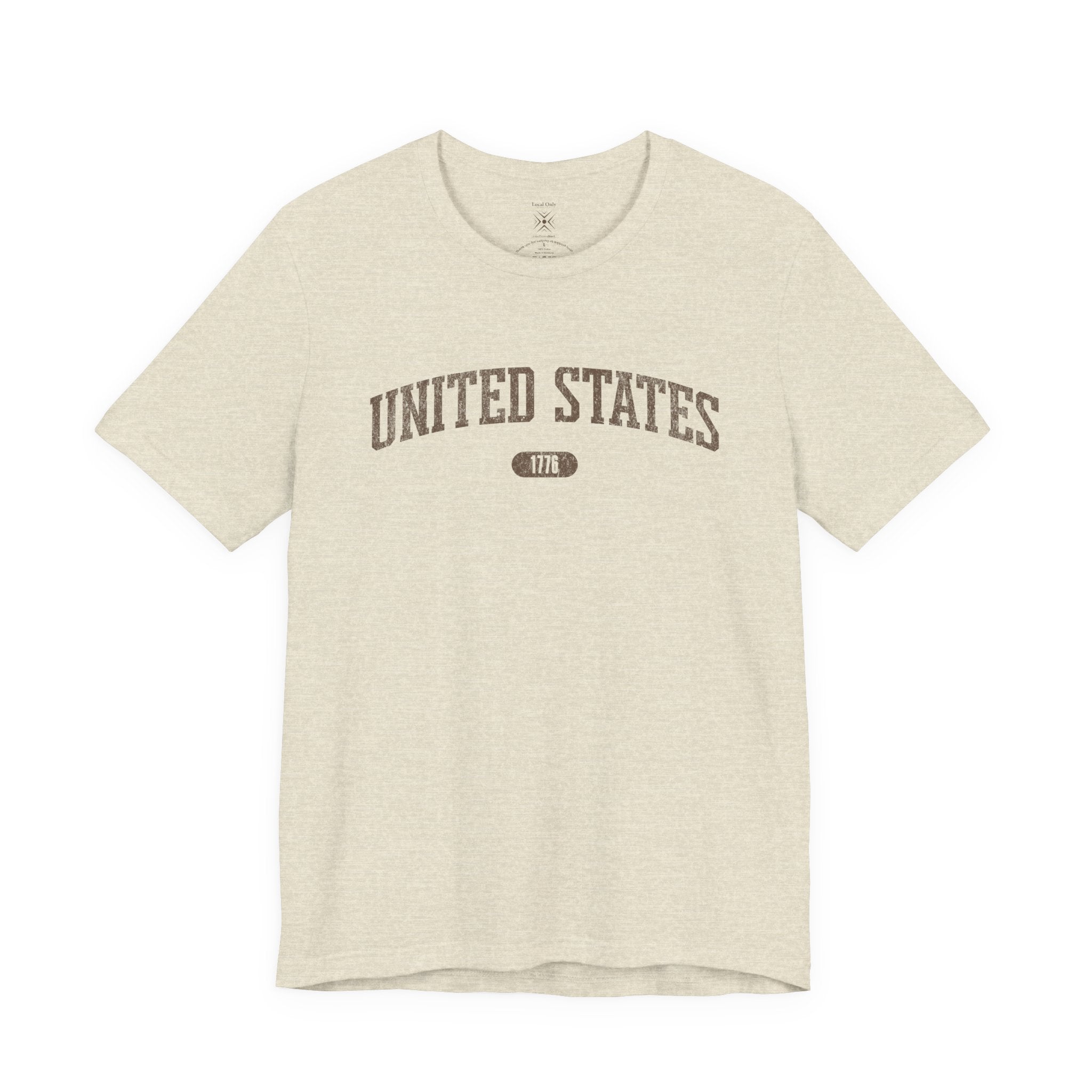 Heather Prism Natural t-shirt with 'UNITED STATES 1776' in brown collegiate text.