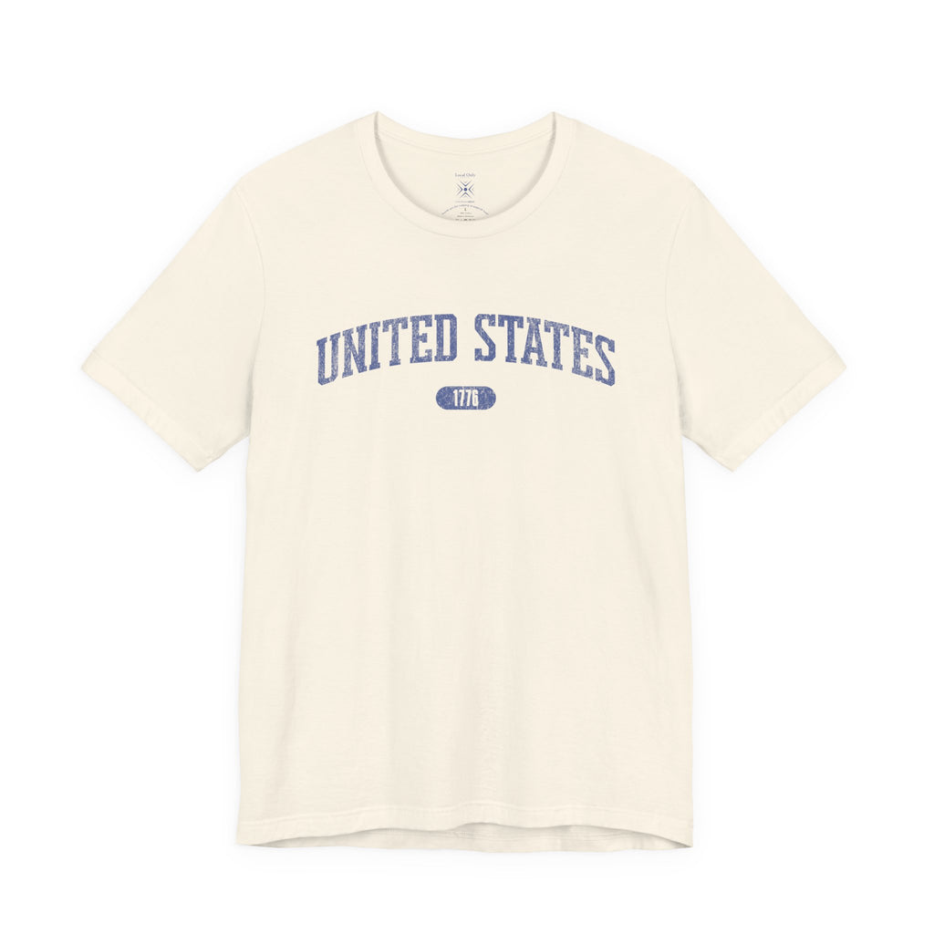 Natural t-shirt with 'UNITED STATES 1776' in blue collegiate text.