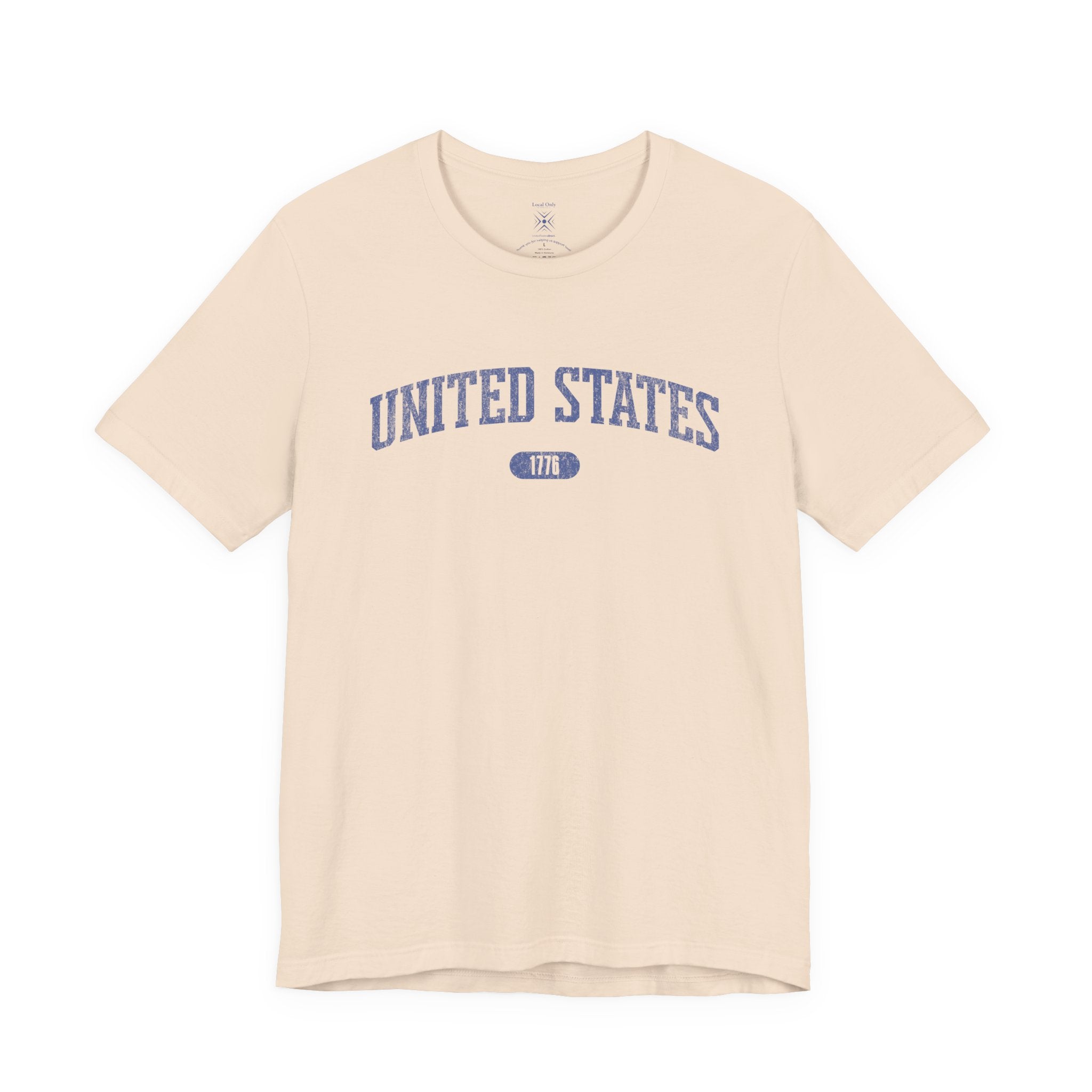 Soft Cream t-shirt with 'UNITED STATES 1776' in blue collegiate text.