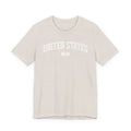 Heather Dust t-shirt with 'UNITED STATES 1776' white collegiate text.