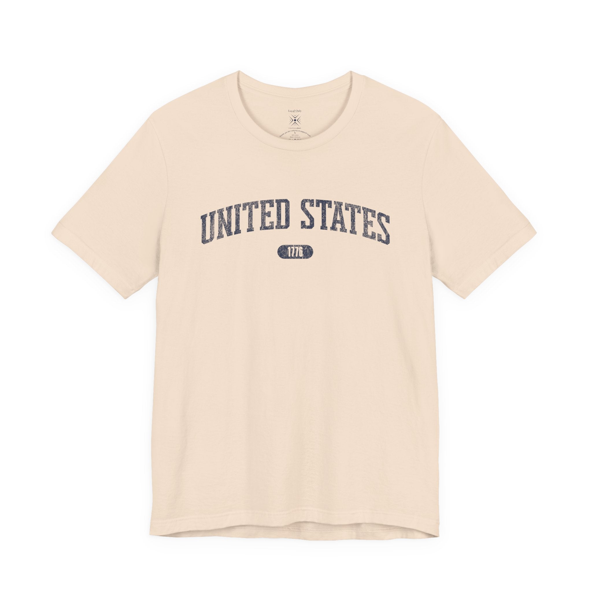 Soft Cream t-shirt with 'UNITED STATES 1776' in navy collegiate text.