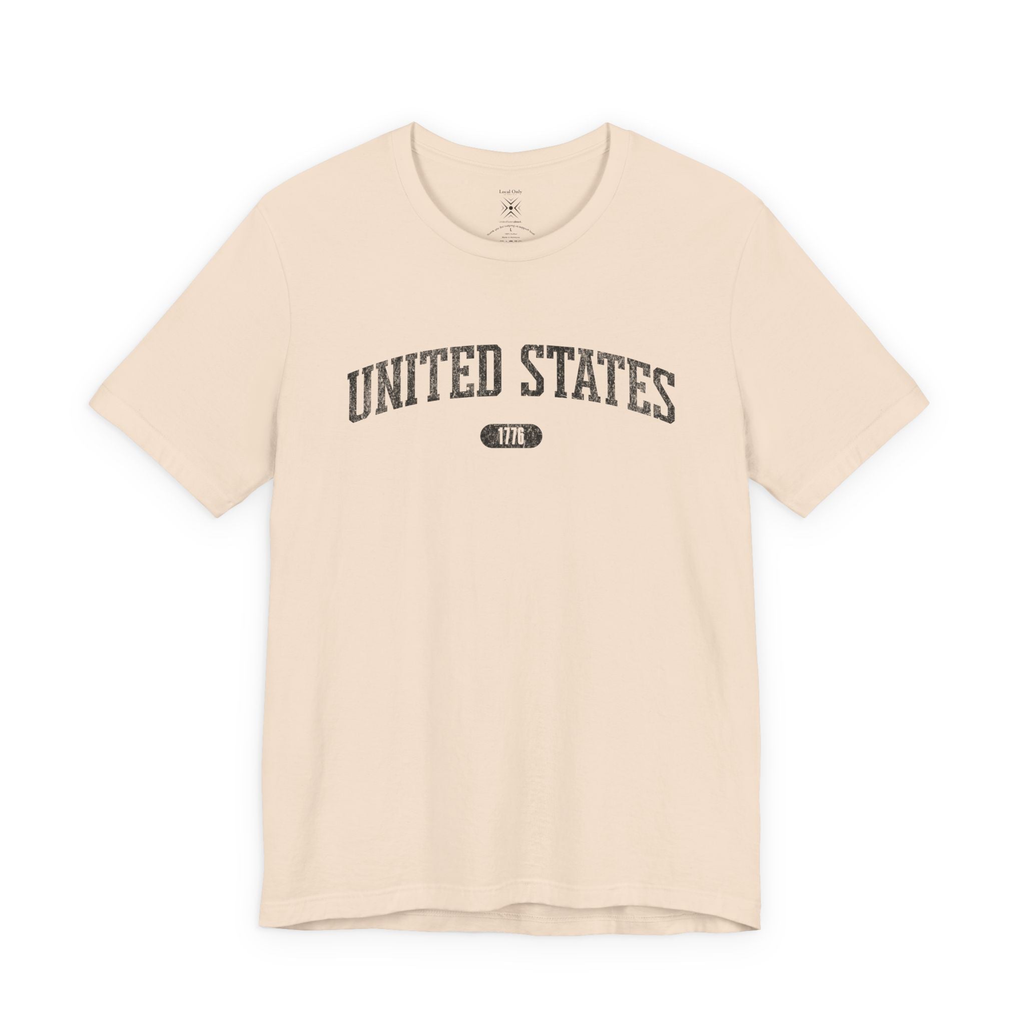 Soft Cream t-shirt with 'UNITED STATES 1776' black collegiate text.