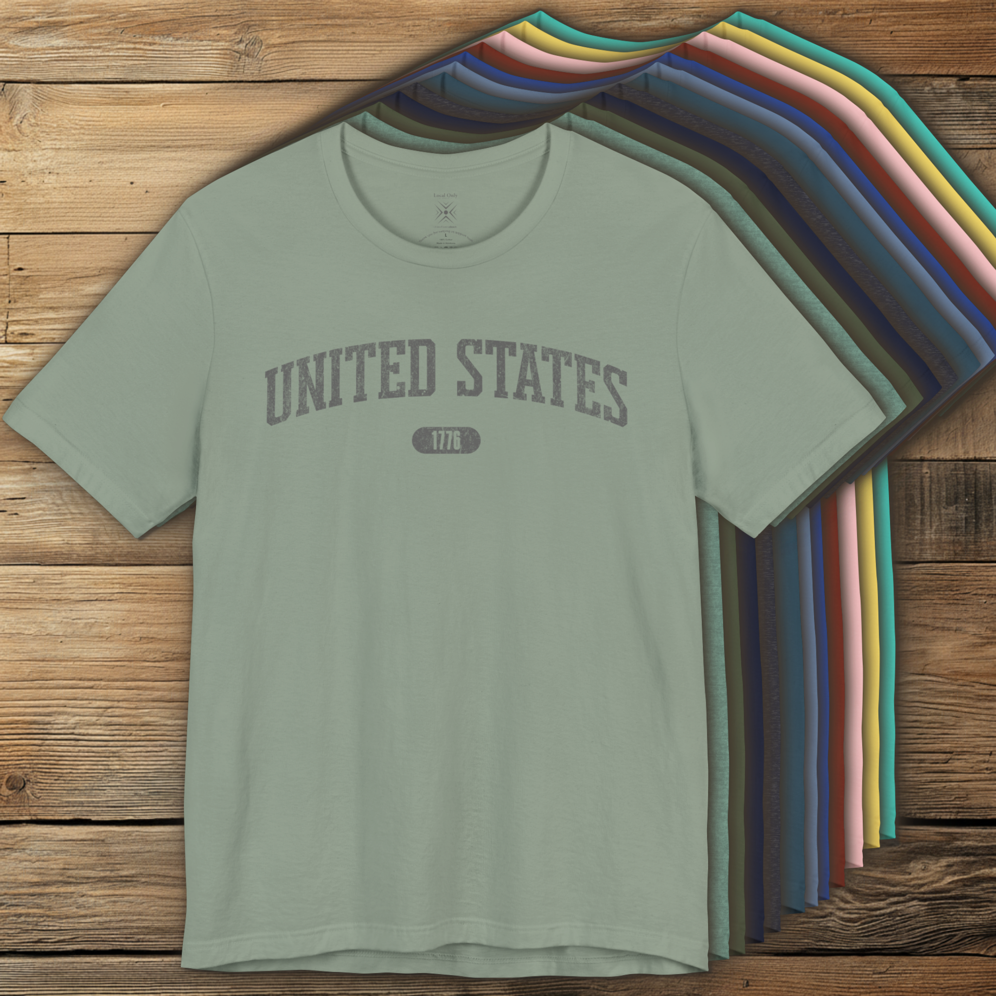Colorful options of premium varsity tees with 'UNITED STATES 1776' in gray.
