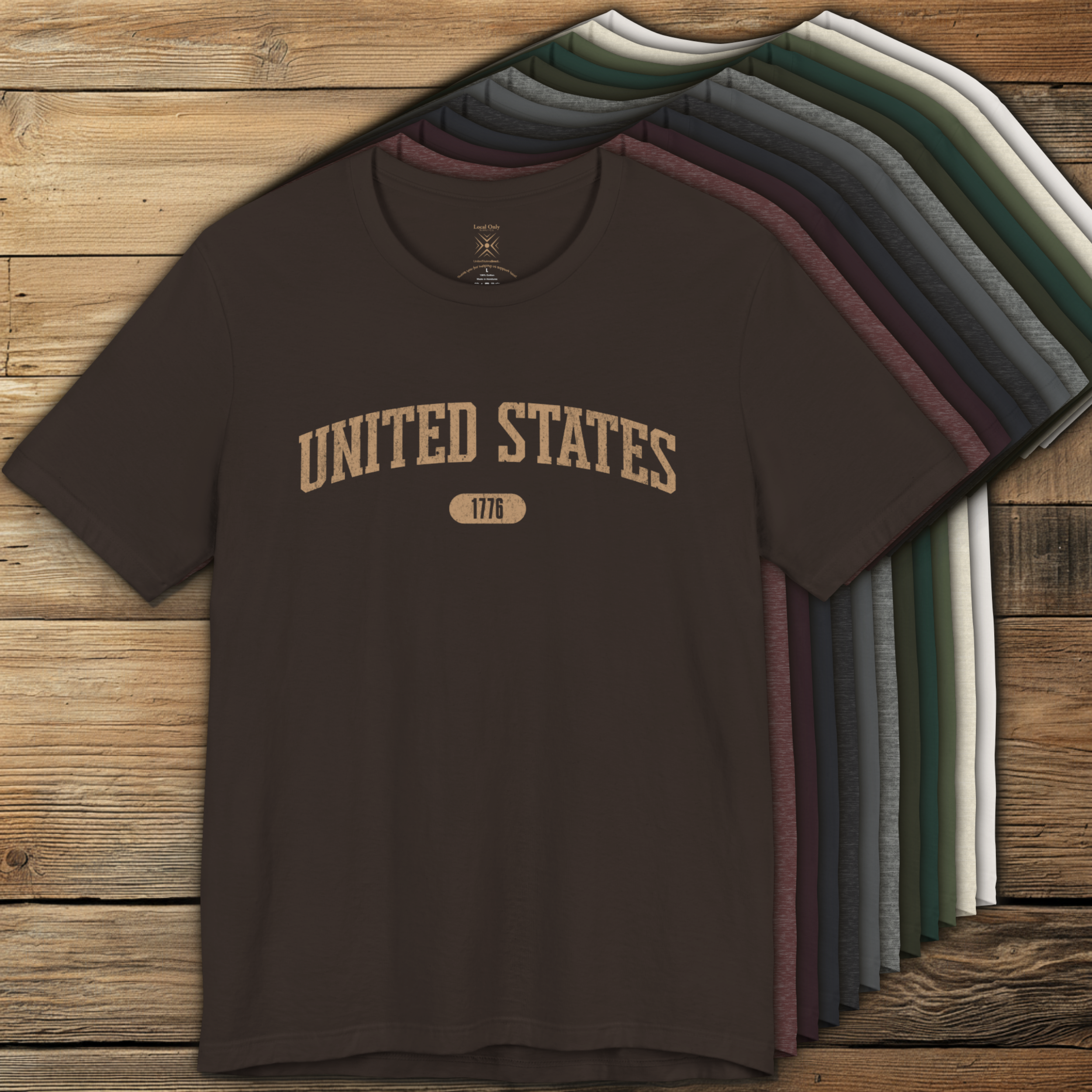 Color options of premium varsity tees with 'UNITED STATES 1776' in warm tan.