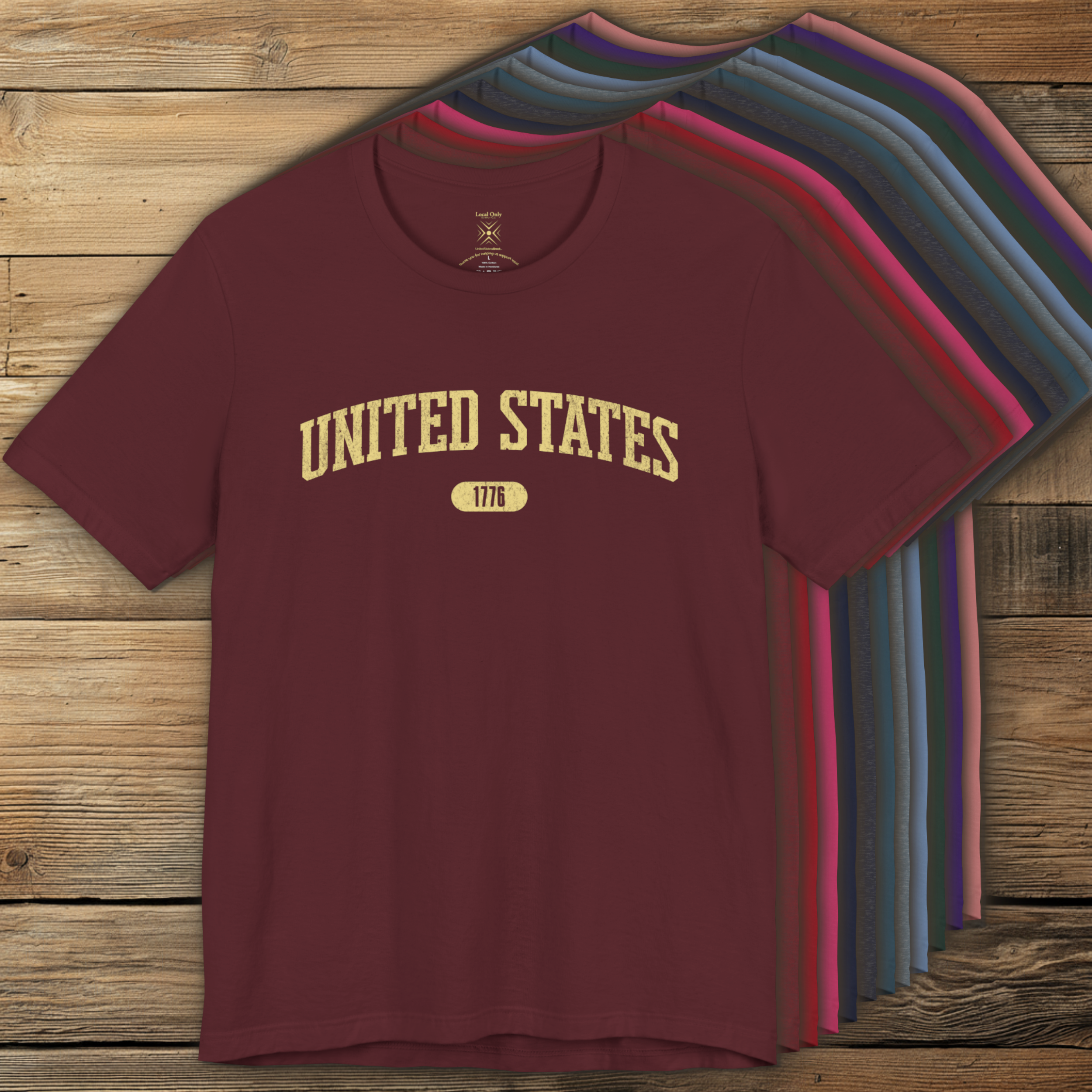 Color options of premium varsity tees with 'UNITED STATES 1776' in butter yellow.
