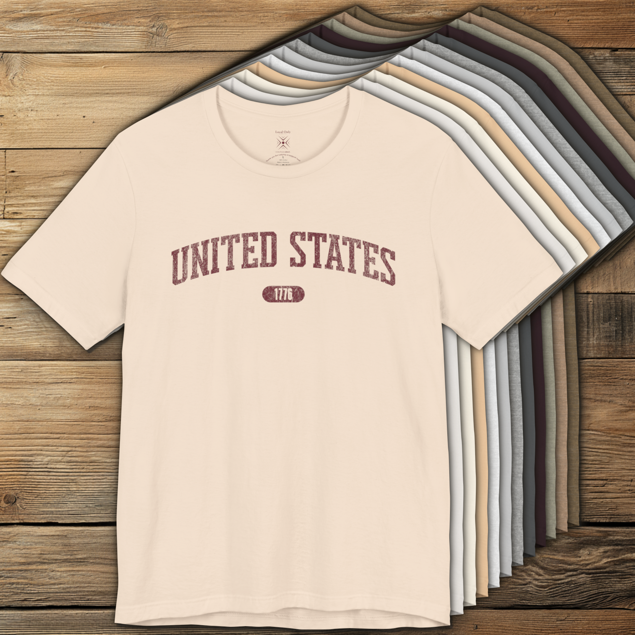 Color options of premium varsity tees with 'UNITED STATES 1776' in burgundy.