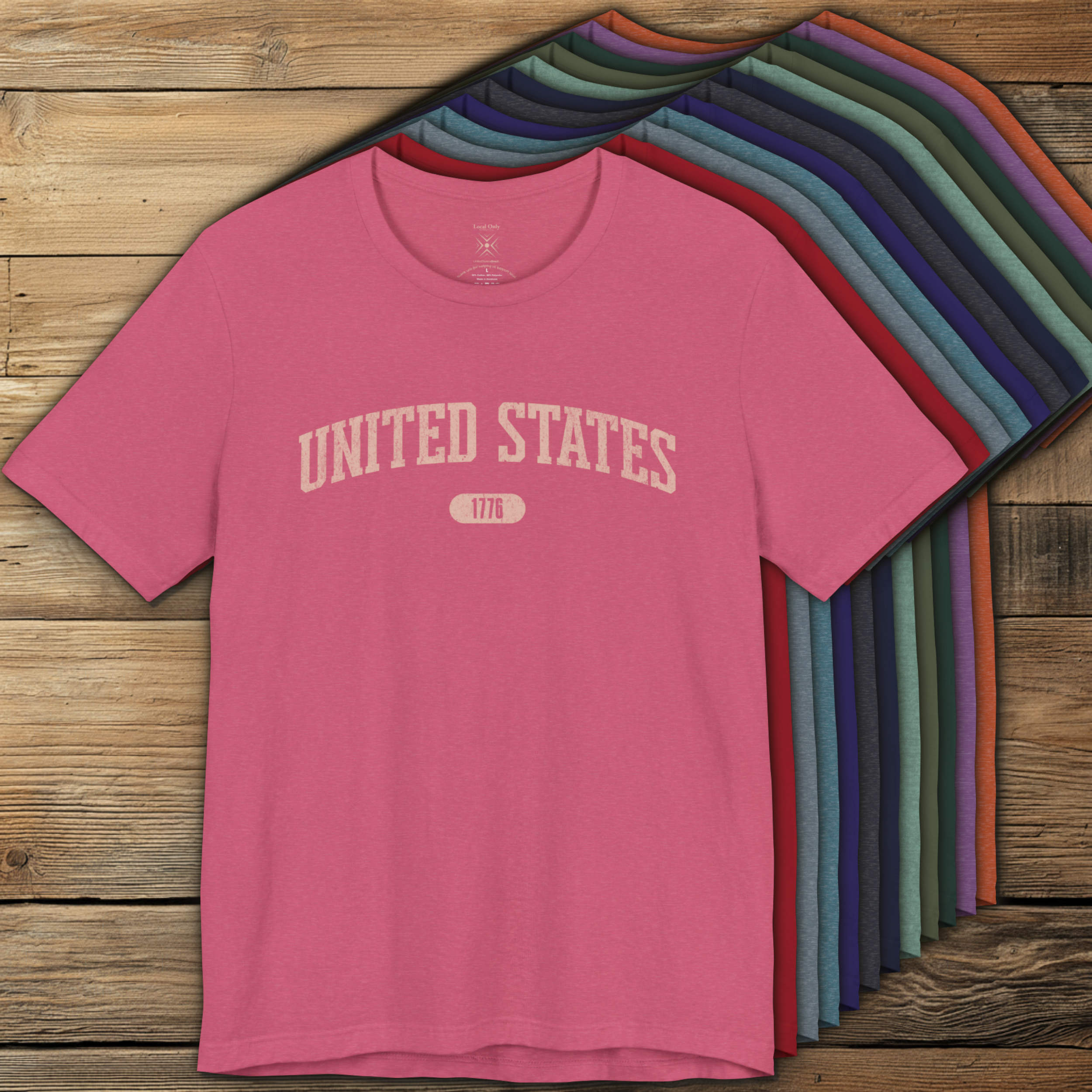 Colorful options of premium varsity tees with 'UNITED STATES 1776' in transcendent pink.