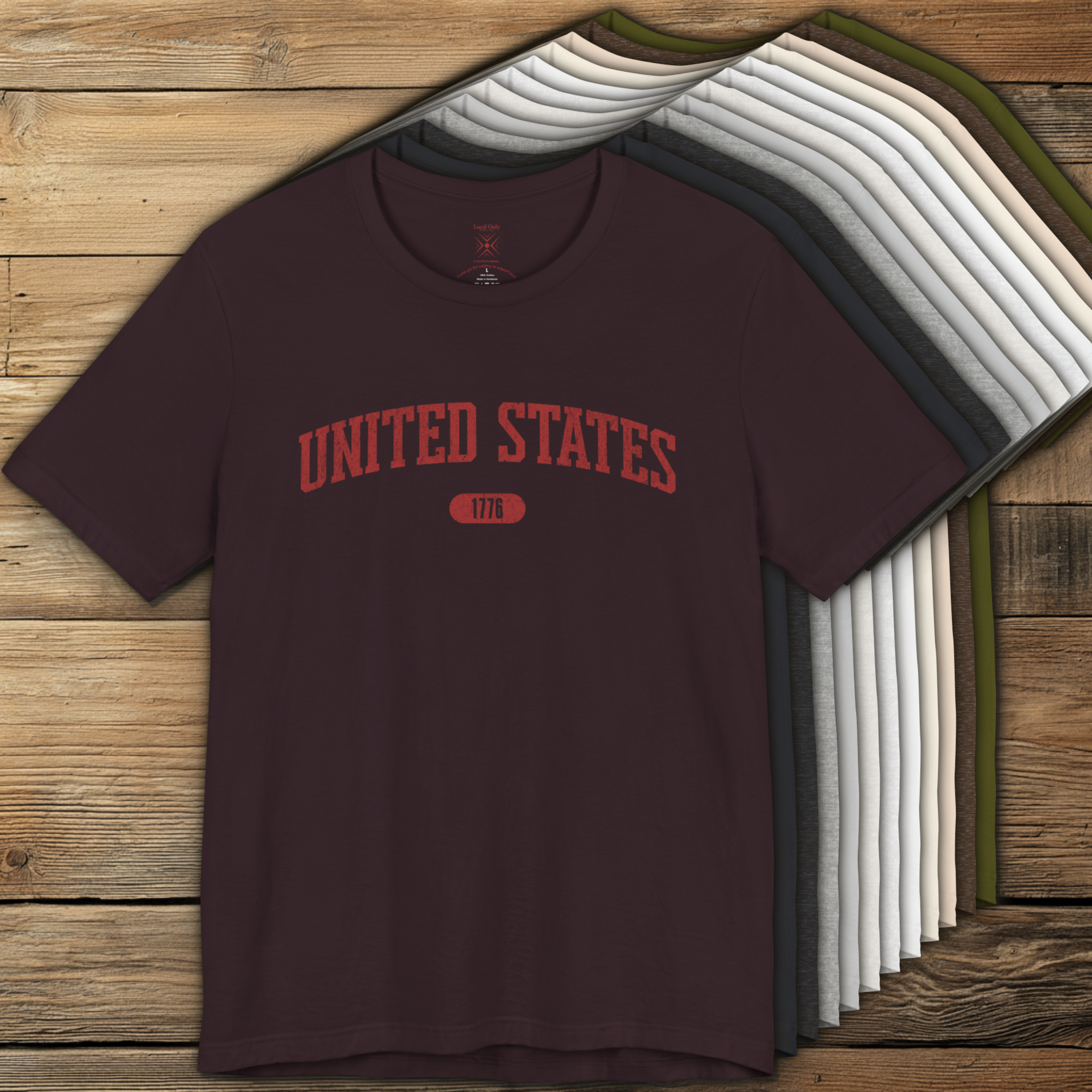 Color options of premium varsity tees with 'UNITED STATES 1776' in muted brick red.