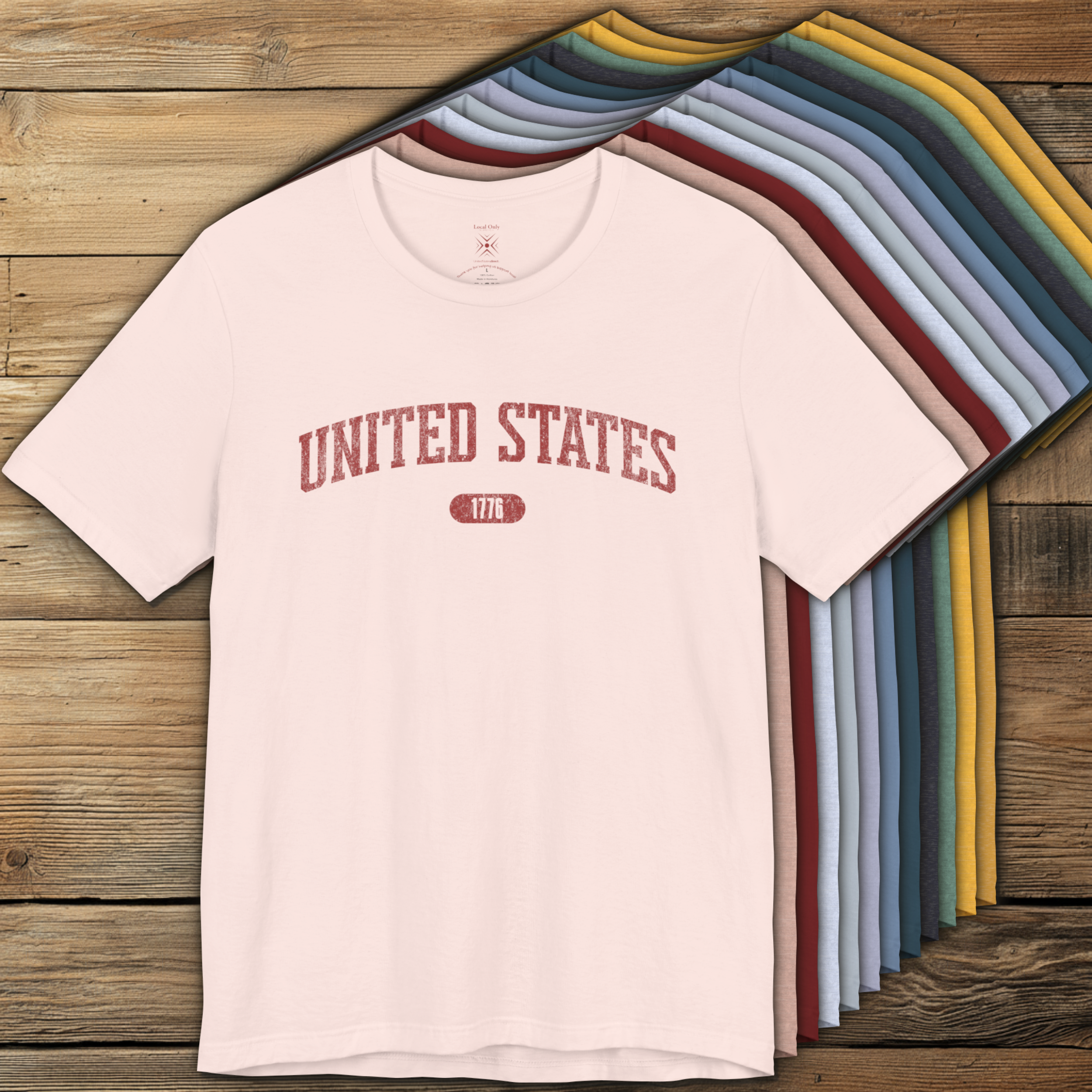 Colorful options of premium varsity tees with 'UNITED STATES 1776' in muted brick red.