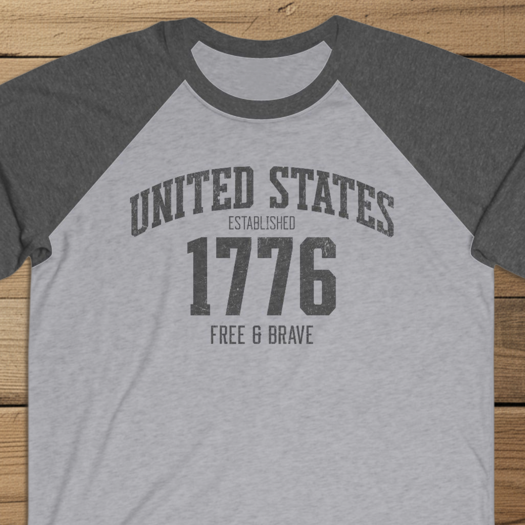 United States 1776 Free & Brave Retro Varsity Raglan Shirt – Charcoal Graphic – Heather Gray with Vintage Black