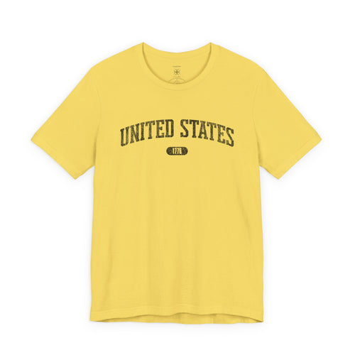 Maize Yellow t-shirt with 'UNITED STATES 1776' in black collegiate text.