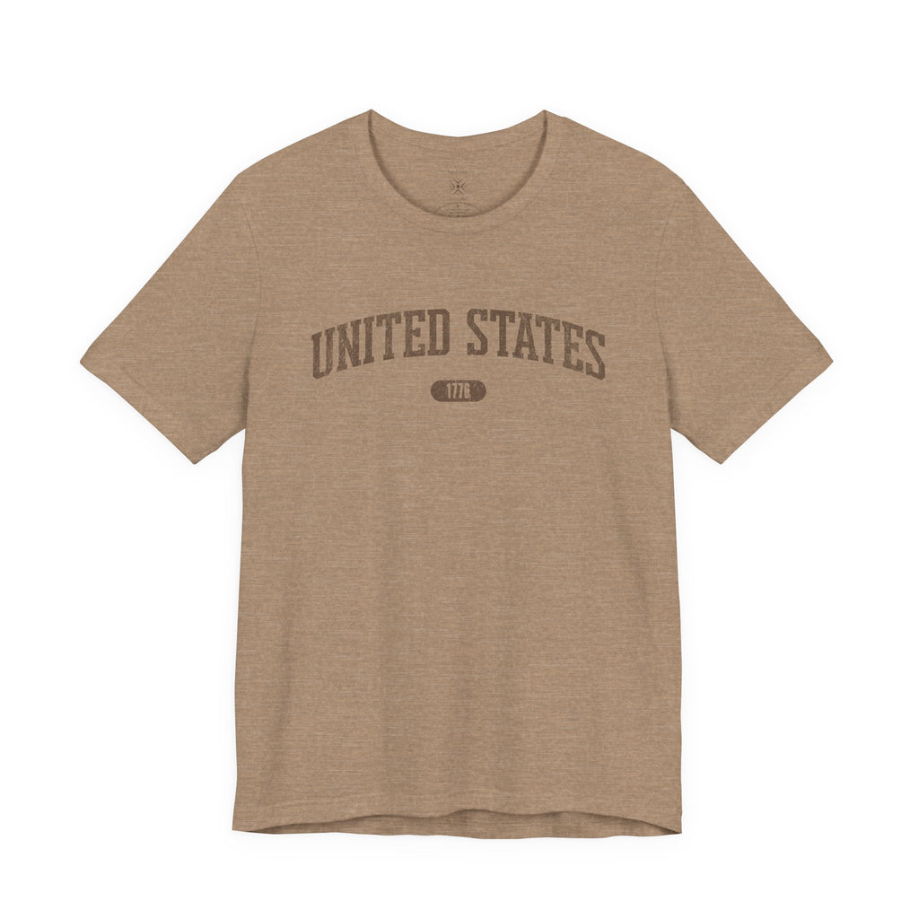 Heather Tan t-shirt with 'UNITED STATES 1776' in brown collegiate text.