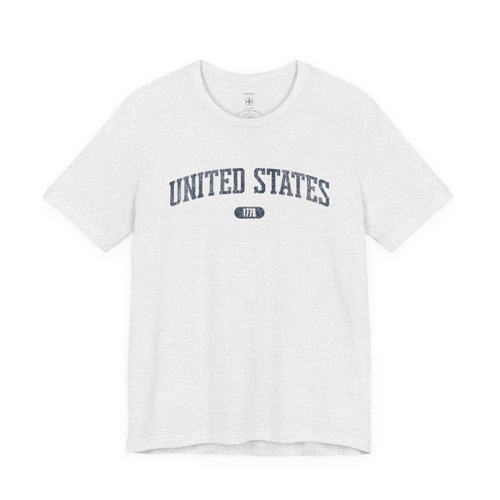 Ash t-shirt with 'UNITED STATES 1776' in navy collegiate text.