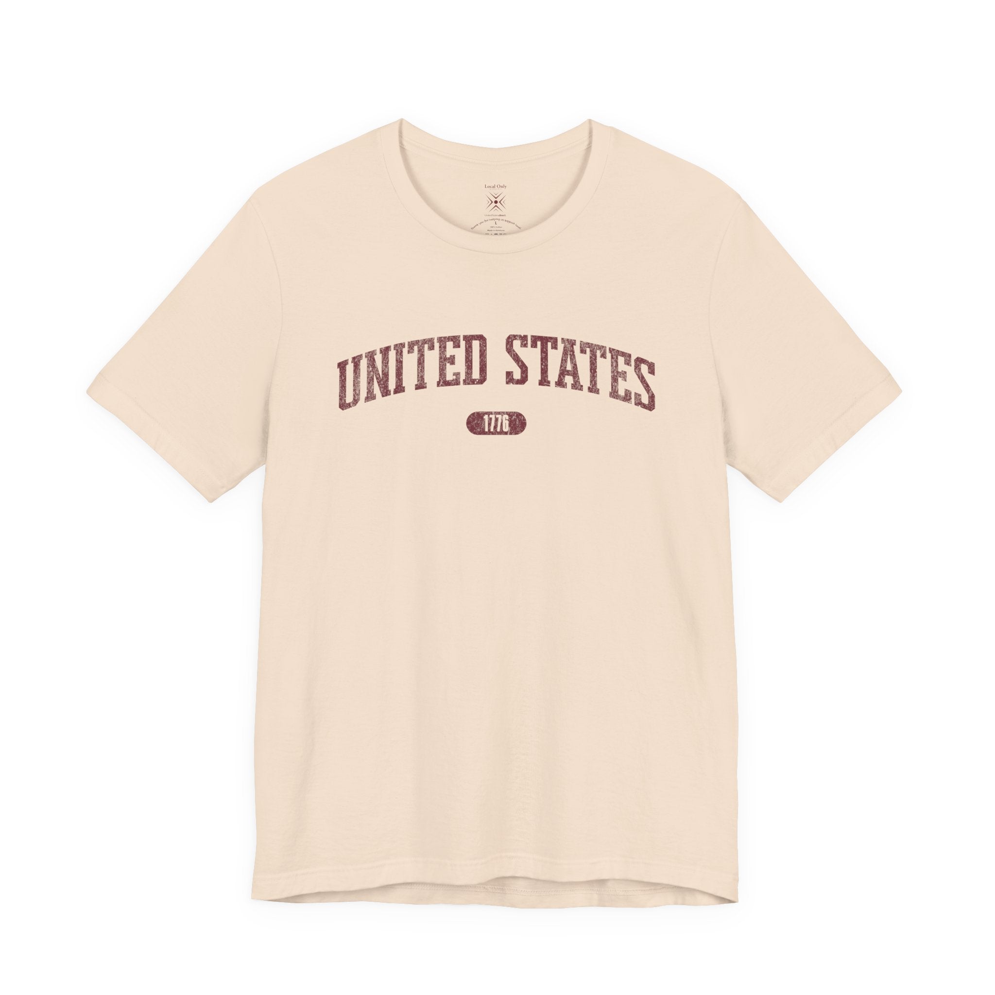 Soft Cream t-shirt with 'UNITED STATES 1776' in burgundy collegiate text.