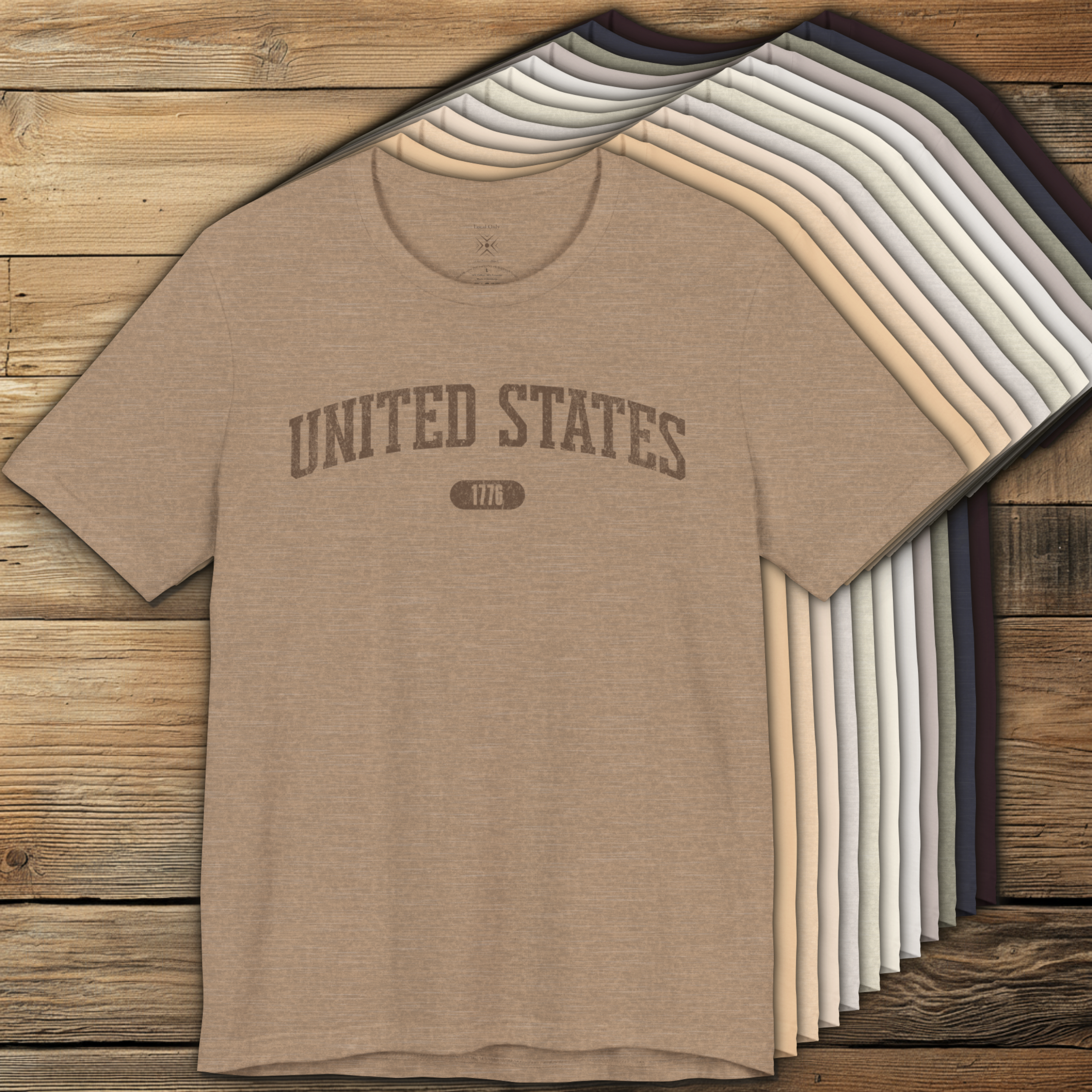 Color options of premium varsity tees with 'UNITED STATES 1776' in washed brown.